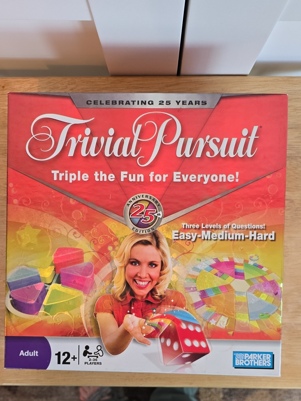 Trivial Pursuit 25th Anniversary Board Game by Parker Brothers - Red